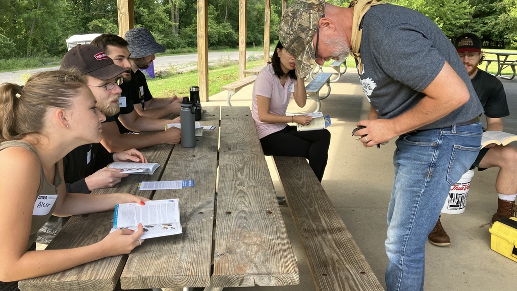 Dave Conrads, Director of UI WILD, teaches law students at MNRA about the importance of bird banding in tracking species health, population, and migration.