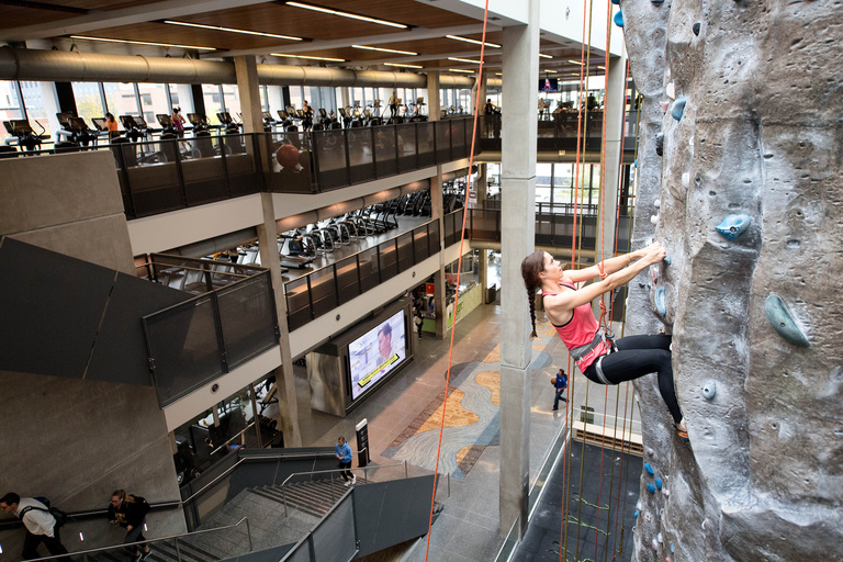 wide shot of climbing wall and fitness areas
