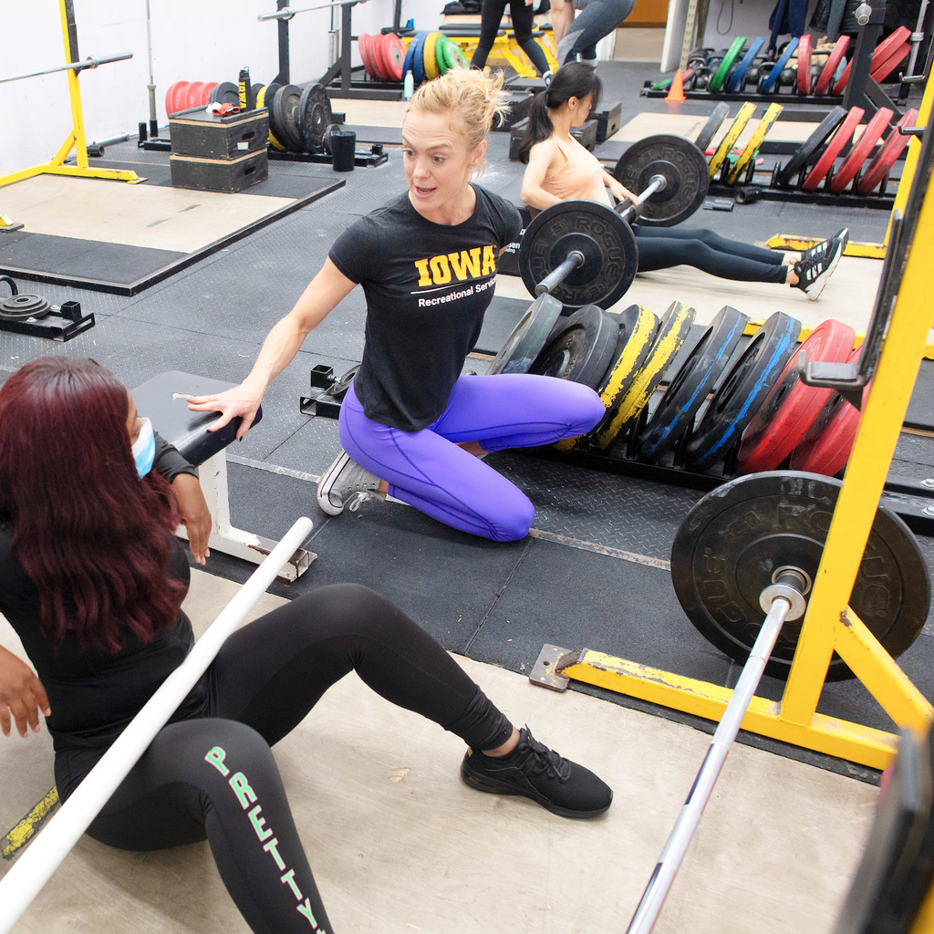 students in a women and weightlifting class