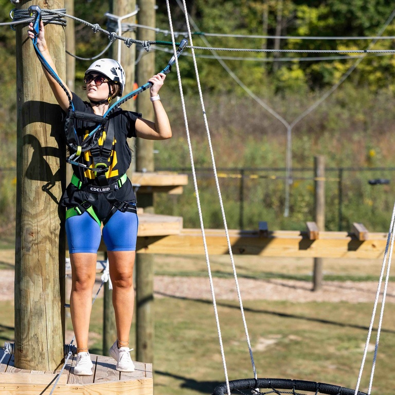 Participant on elements of the UI Challenge Course. 