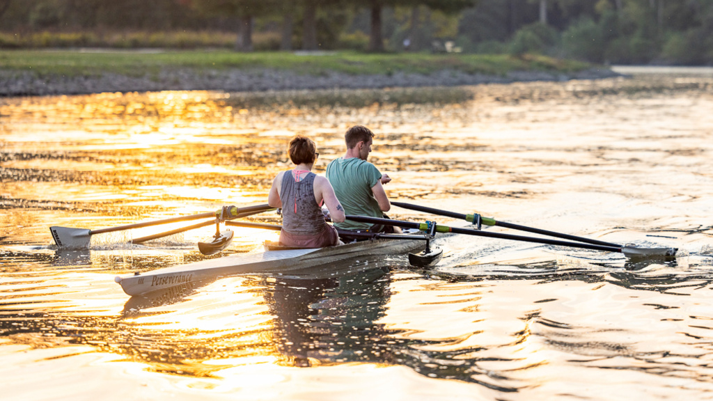 Rowers on the Iowa River participating in Recreational Rowing.